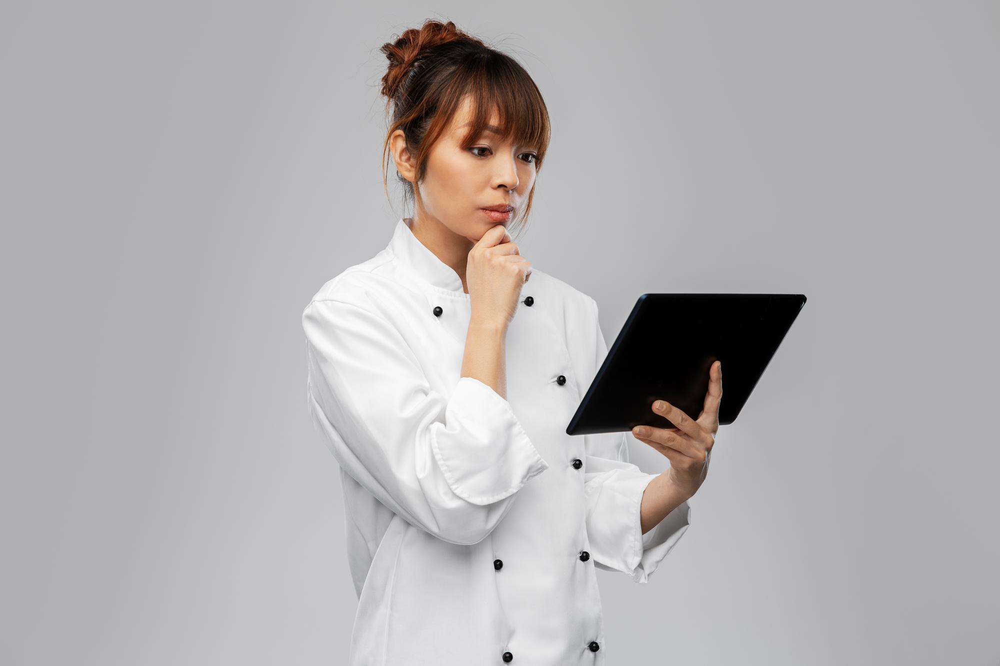 modern chef using smart kitchen tools